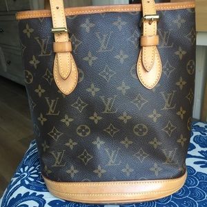 Gorgeous vintage bucket bag Louis Vuitton, golden Patina